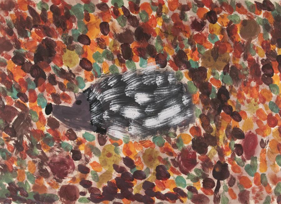 Herbst: Tier versteckt sich im Laub