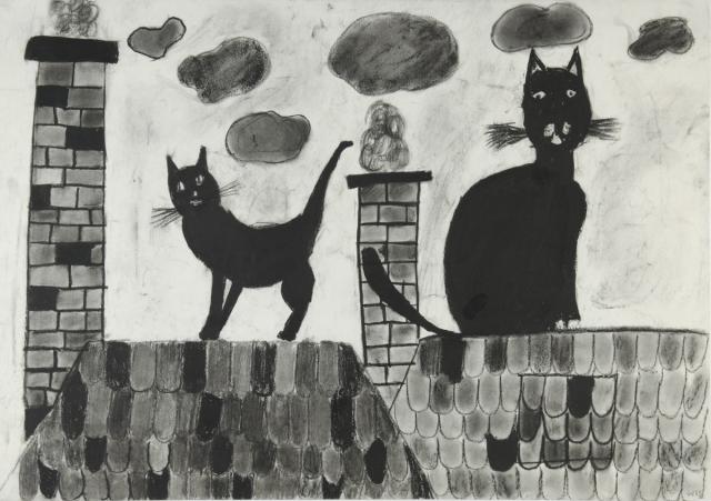 Tier: Katzen auf Hausdächern