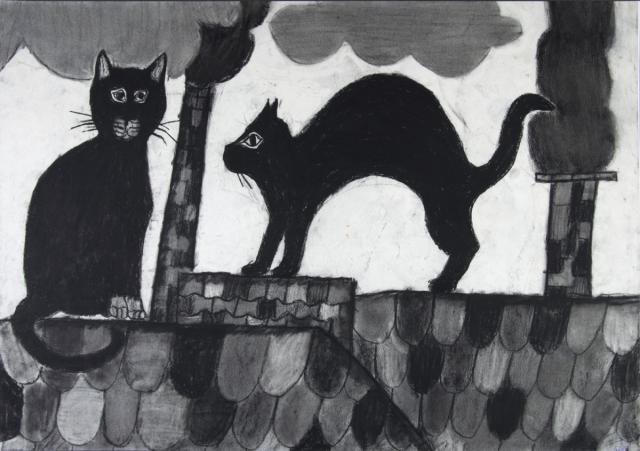 Tier: Katzen auf Hausdächern