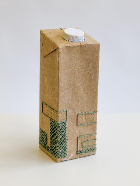 Tetra-Wort-Stickerei