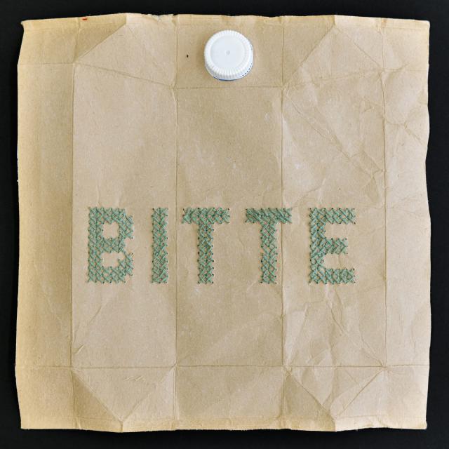 Tetra-Wort-Stickerei