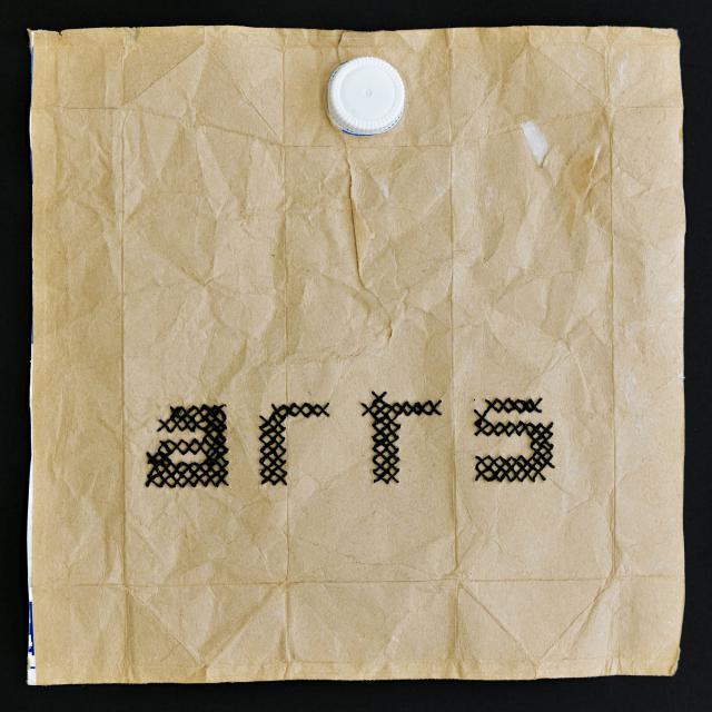 Tetra-Wort-Stickerei